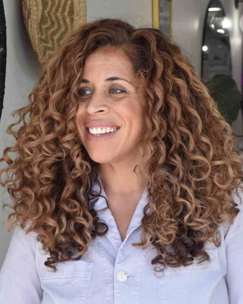 13. The Side-Parted Curly Bob