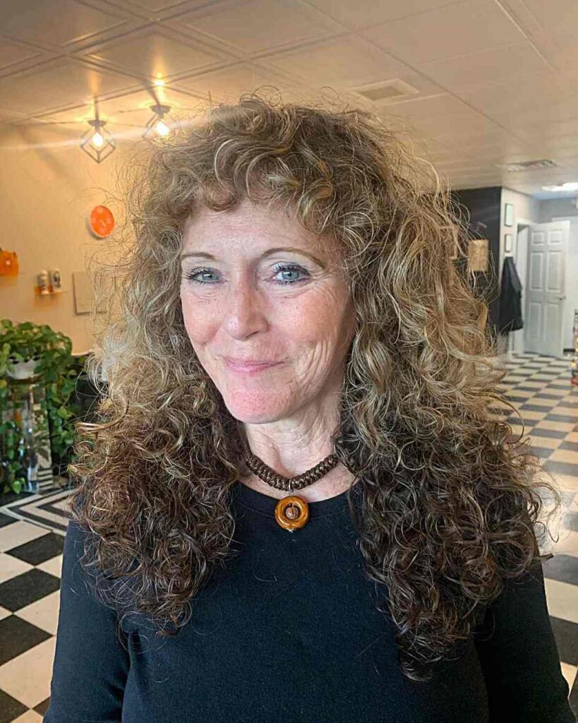 3. The Curly Shag: Effortless Volume & Attitude After 50