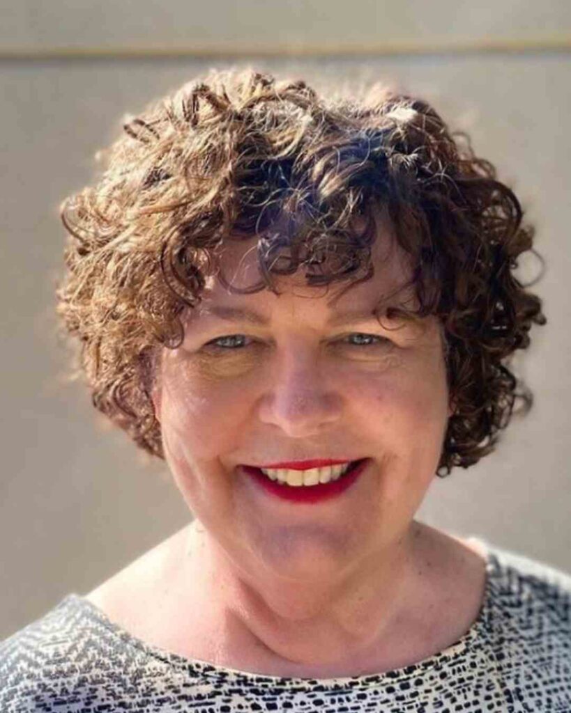6. The Layered Curly Bob (Ear-Length)